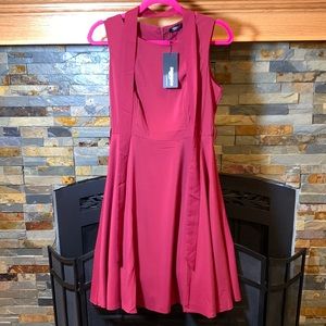 NWT size small flowy light weight dress with liner.  Beautiful wine color.